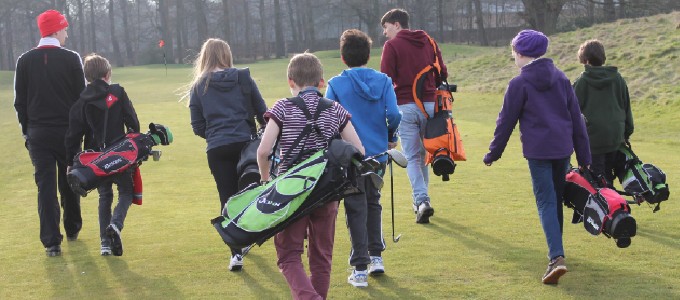 Junior Golfers Walking